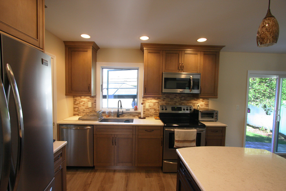Example of a transitional kitchen design in New York