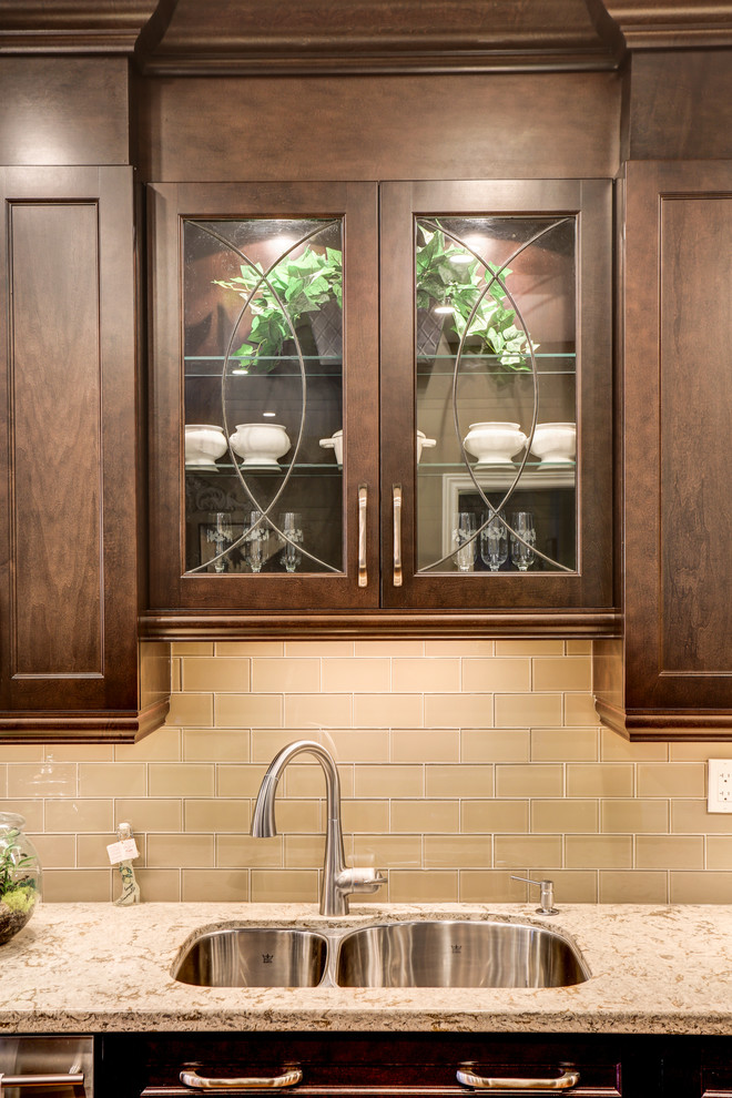 Example of a transitional kitchen design in Toronto
