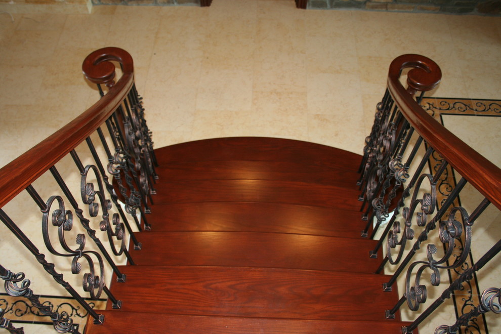 Design ideas for a large mediterranean wood straight staircase in Orlando with wood risers.