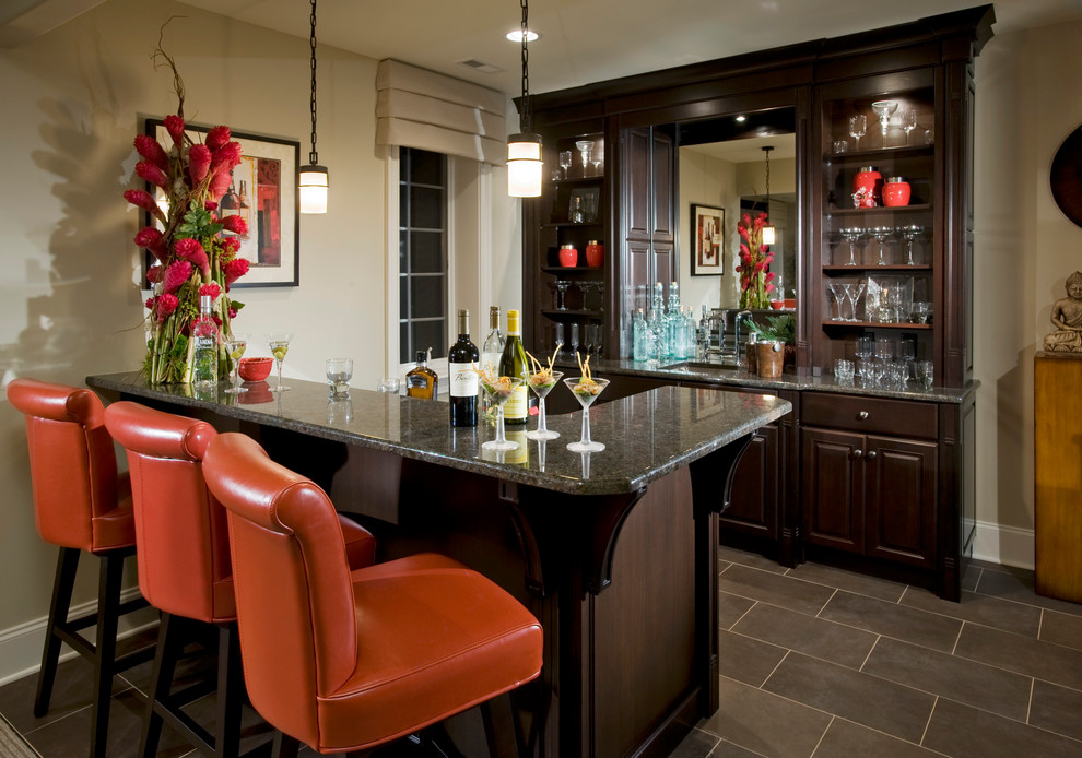 This is an example of a traditional home bar in Philadelphia with slate floors and grey floor.