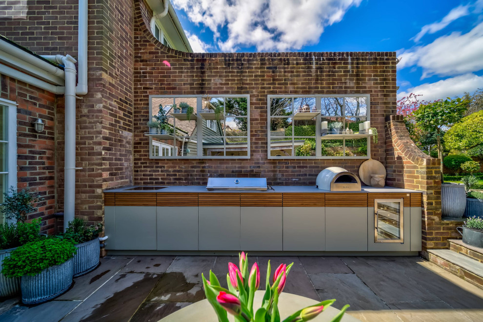 A contemporary outdoor kitchen masterpiece - Contemporary - Patio ...