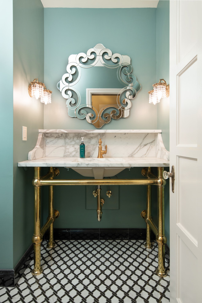 Inspiration for a traditional powder room in Kansas City with blue walls, porcelain floors, an undermount sink, marble benchtops, black floor and white benchtops.