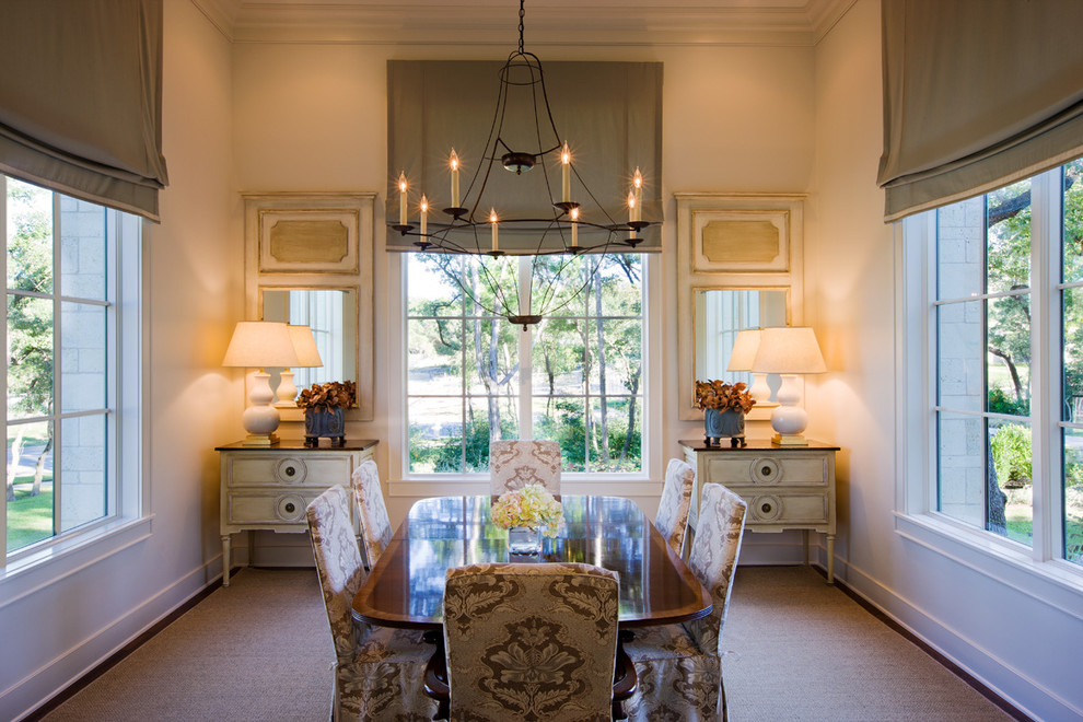 Inspiration for a transitional separate dining room in Austin with white walls and dark hardwood floors.