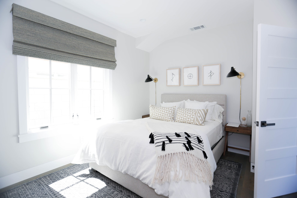 Photo of a mid-sized transitional guest bedroom in Orange County with grey walls, dark hardwood floors, no fireplace and brown floor.