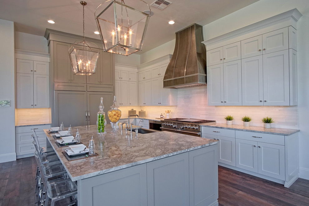 Example of a transitional kitchen design in Phoenix with shaker cabinets