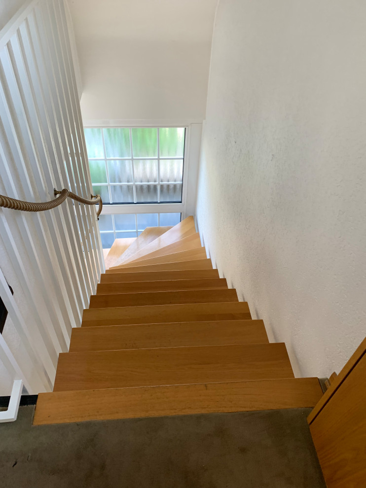 Modernisierung Einfamilienhaus mit Erweiterung der Gauben und  Fensteraufteilung