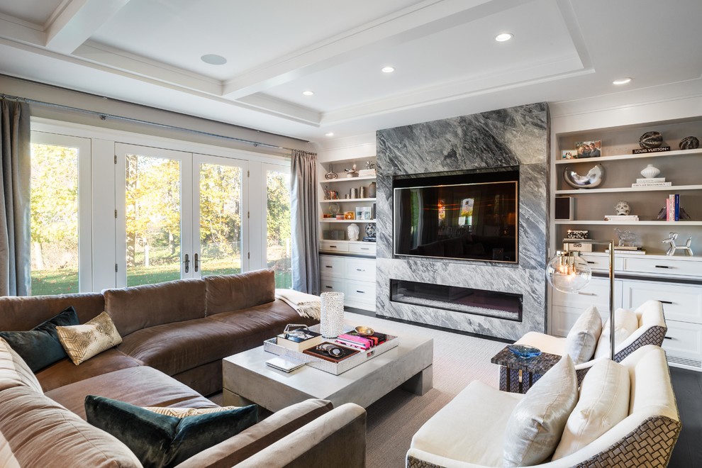 Transitional formal enclosed living room in New York with grey walls, a ribbon fireplace, a stone fireplace surround, a wall-mounted tv and black floor.