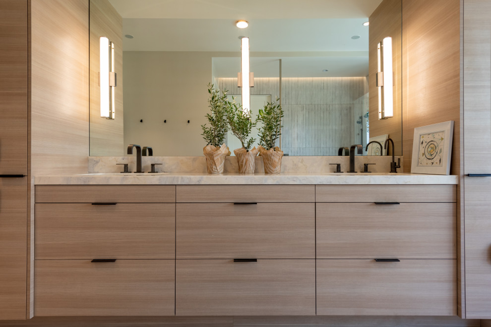 This is an example of an expansive farmhouse ensuite bathroom in San Francisco with flat-panel cabinets, distressed cabinets, a submerged bath, a built-in shower, a wall mounted toilet, beige tiles, porcelain tiles, grey walls, mosaic tile flooring, a submerged sink, quartz worktops, beige floors, an open shower, white worktops, a shower bench, double sinks, a built in vanity unit, all types of ceiling and all types of wall treatment.
