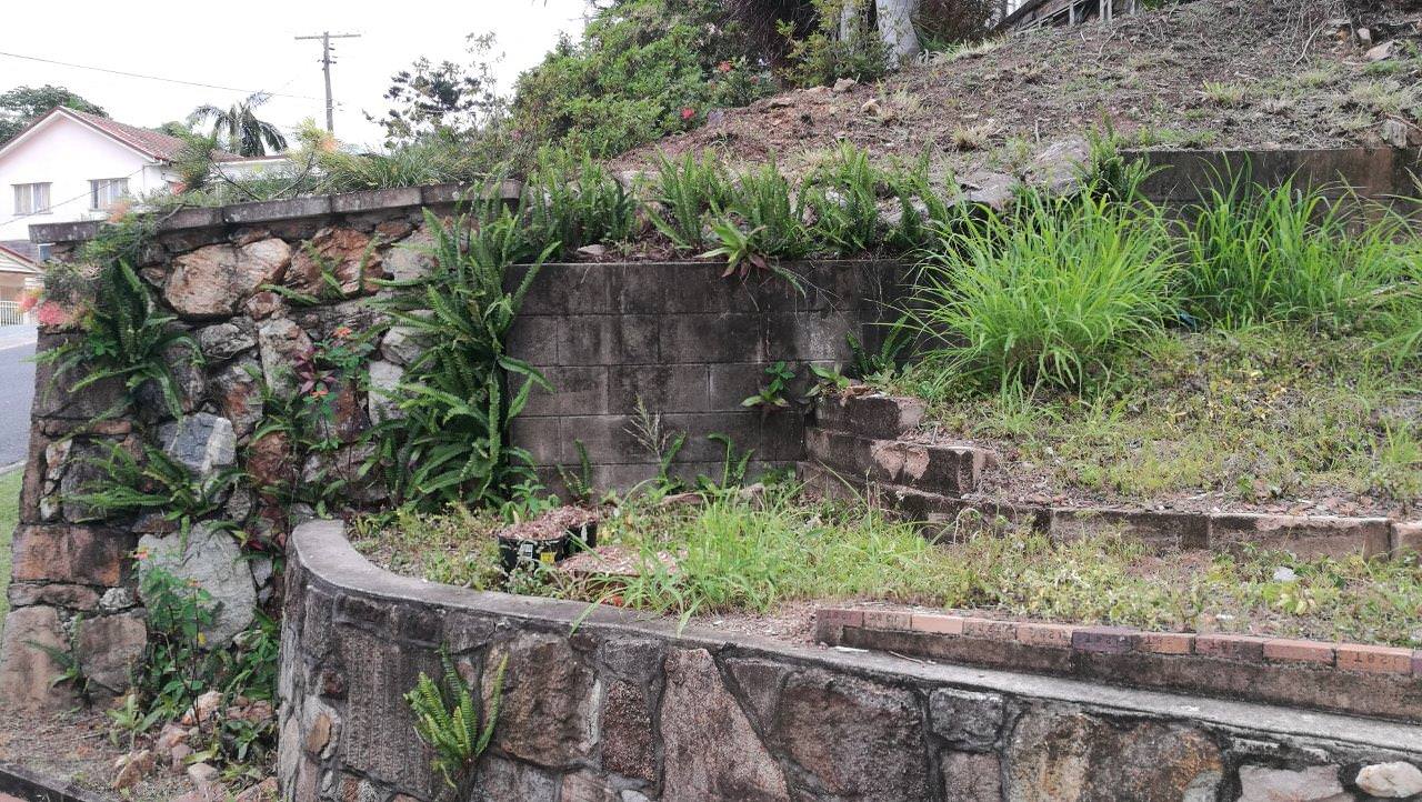 crumbling retaining walls to neighbouring property