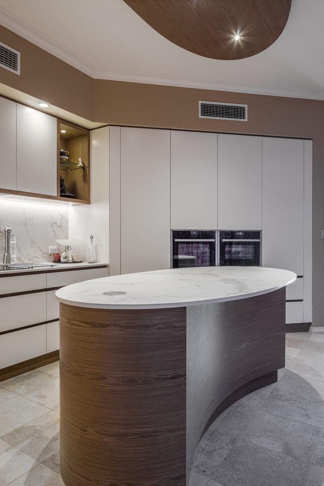 Modern kitchen in Perth with flat-panel cabinets, medium wood cabinets, quartz benchtops, grey splashback, marble splashback, with island and grey benchtop.
