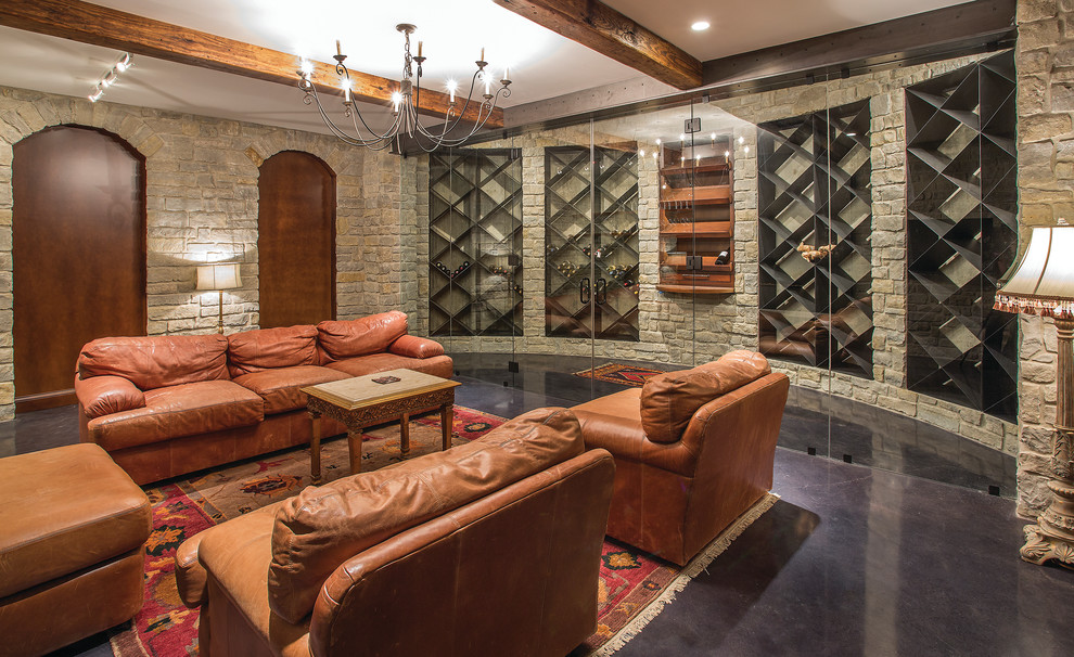 Design ideas for a large transitional wine cellar in Cincinnati with concrete floors, diamond bins and brown floor.