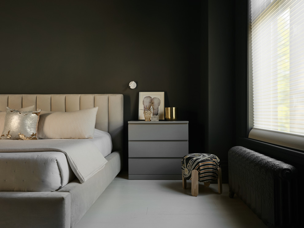 Example of a minimalist master painted wood floor and white floor bedroom design in Montreal with gray walls