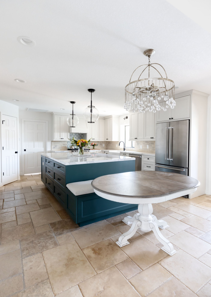 Inspiration for a large country u-shaped kitchen in Phoenix with a farmhouse sink, shaker cabinets, green cabinets, quartz benchtops, white splashback, brick splashback, stainless steel appliances, terrazzo floors, with island, beige floor and white benchtop.