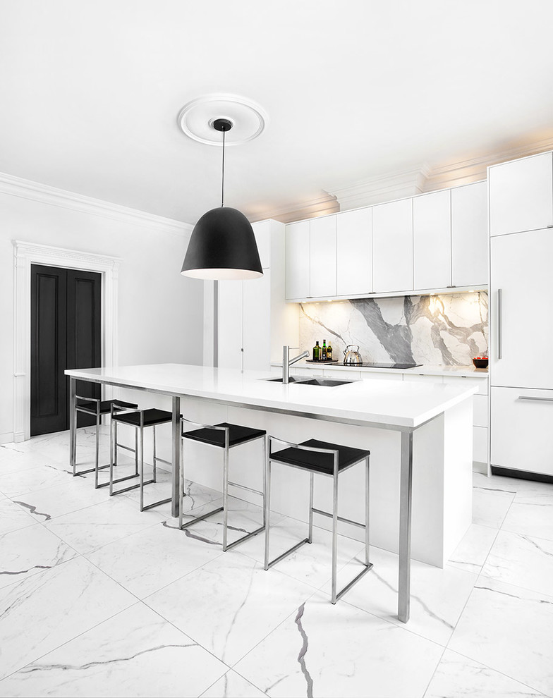 Photo of a large contemporary single-wall kitchen pantry in Toronto with an undermount sink, flat-panel cabinets, white cabinets, quartz benchtops, white splashback, stone slab splashback, stainless steel appliances, porcelain floors and with island.