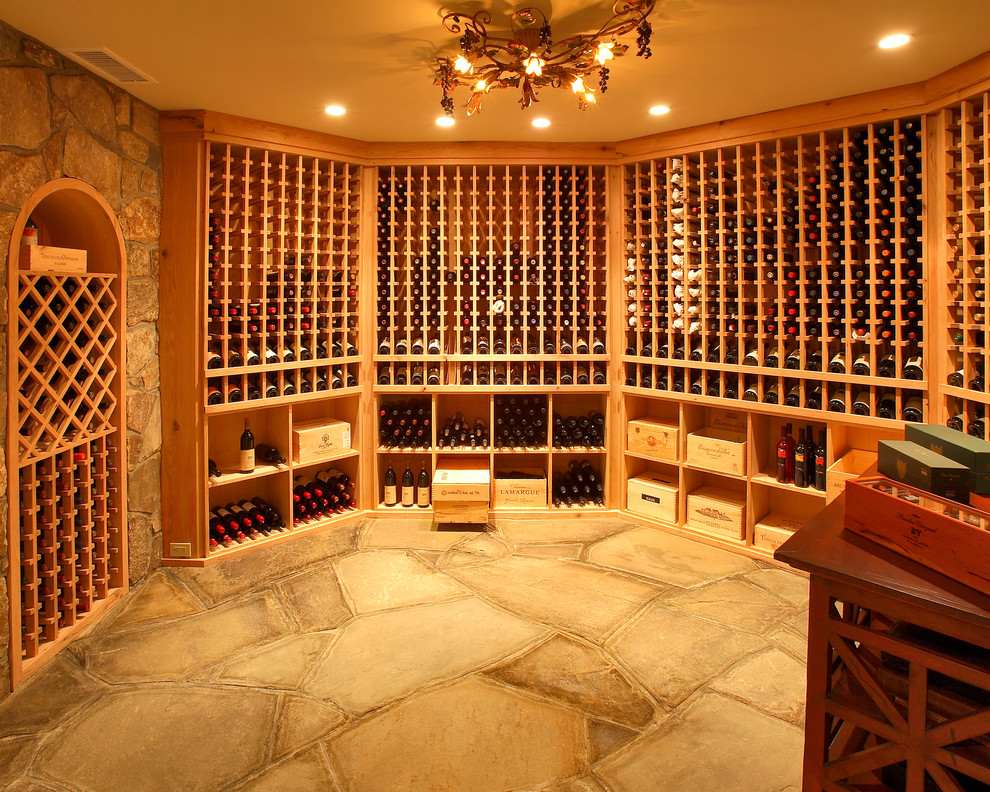 Design ideas for a traditional wine cellar in New York with storage racks.