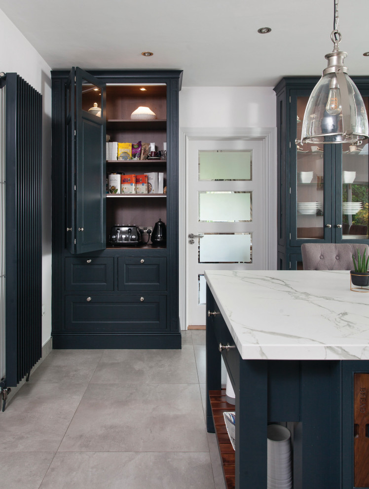 Inspiration for a large traditional galley eat-in kitchen in Other with shaker cabinets and black cabinets.