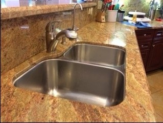 Need help replacing double bowl undermount kit. sink for a single