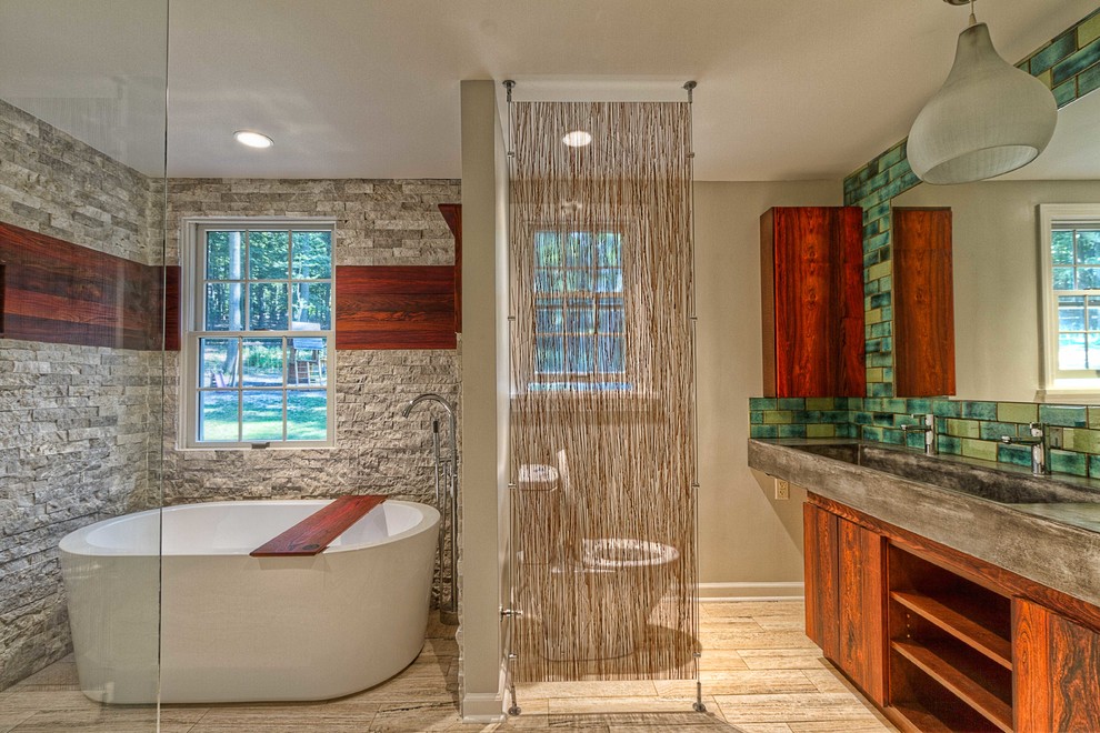 This is an example of a large midcentury 3/4 bathroom in Other with a freestanding tub, a trough sink, flat-panel cabinets, dark wood cabinets, concrete benchtops, green tile, beige walls, a two-piece toilet, porcelain floors, beige floor, a corner shower, an open shower and cement tile.