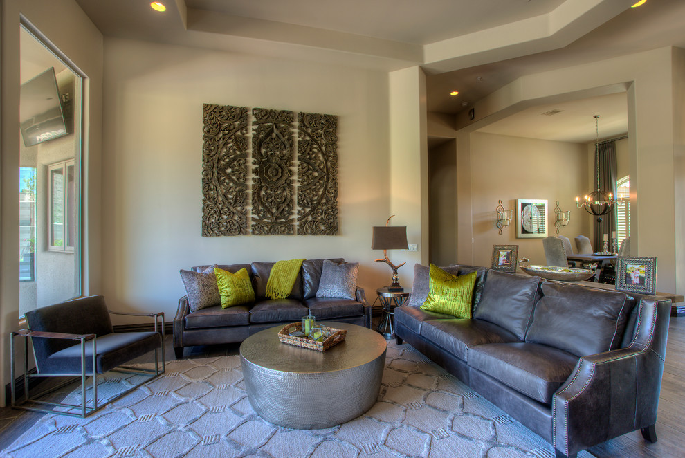 Modern formal open concept living room in Austin with beige walls, dark hardwood floors and no tv.