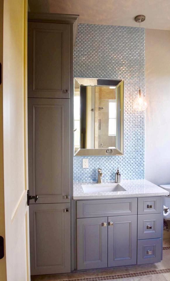 Inspiration for a mid-sized transitional ceramic tile and beige floor alcove shower remodel in Austin with recessed-panel cabinets, gray cabinets, beige walls, an undermount sink, quartzite countertops, a hinged shower door and white countertops