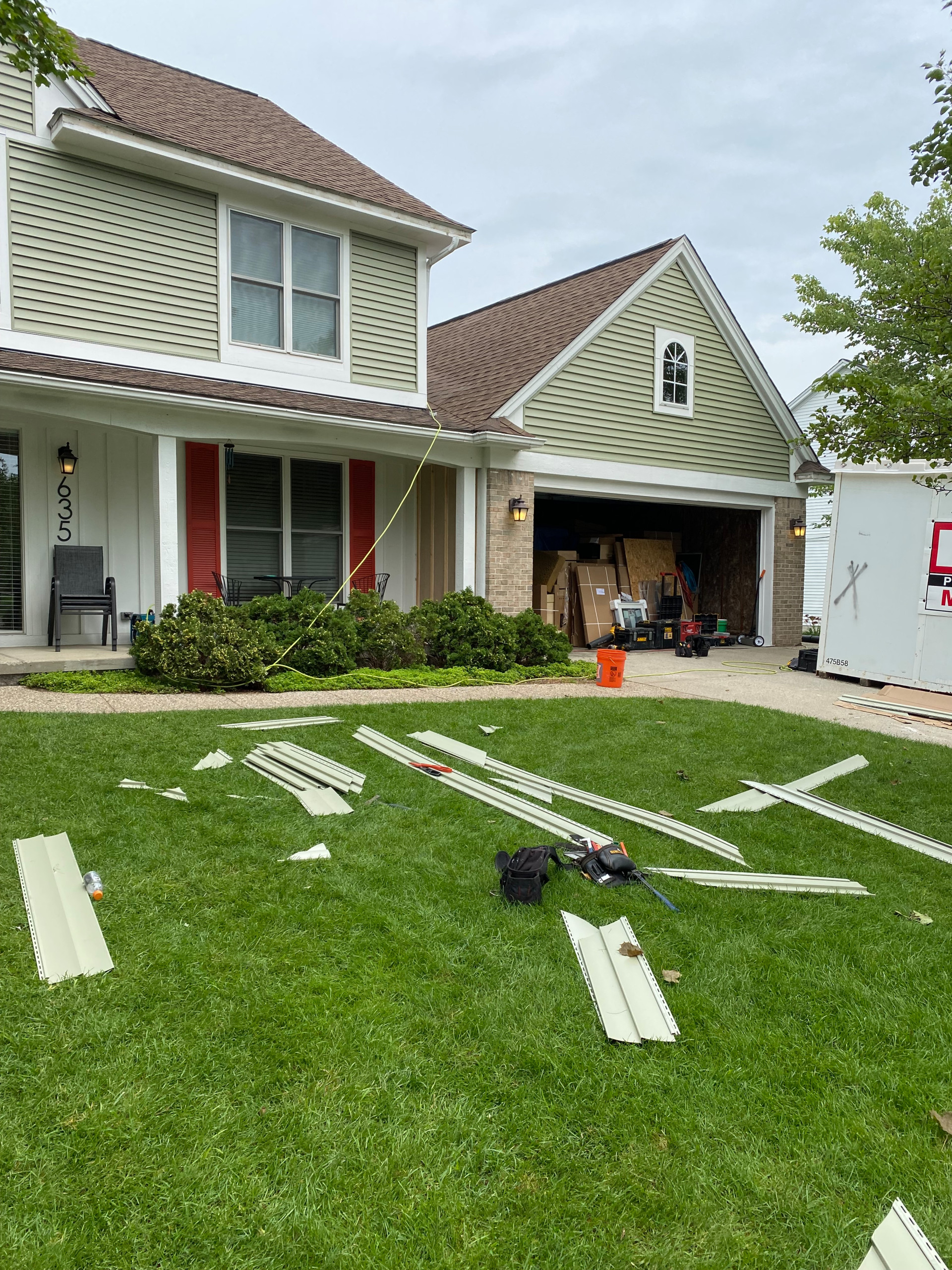 Lake Orion addition with kitchen, baths, office, siding and patio.