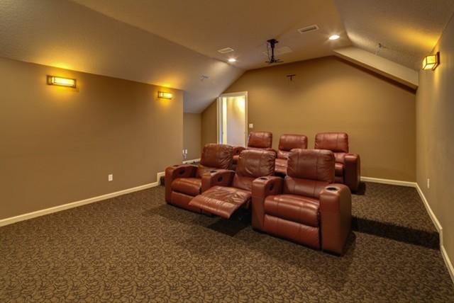 Photo of a contemporary home theatre in Jacksonville.