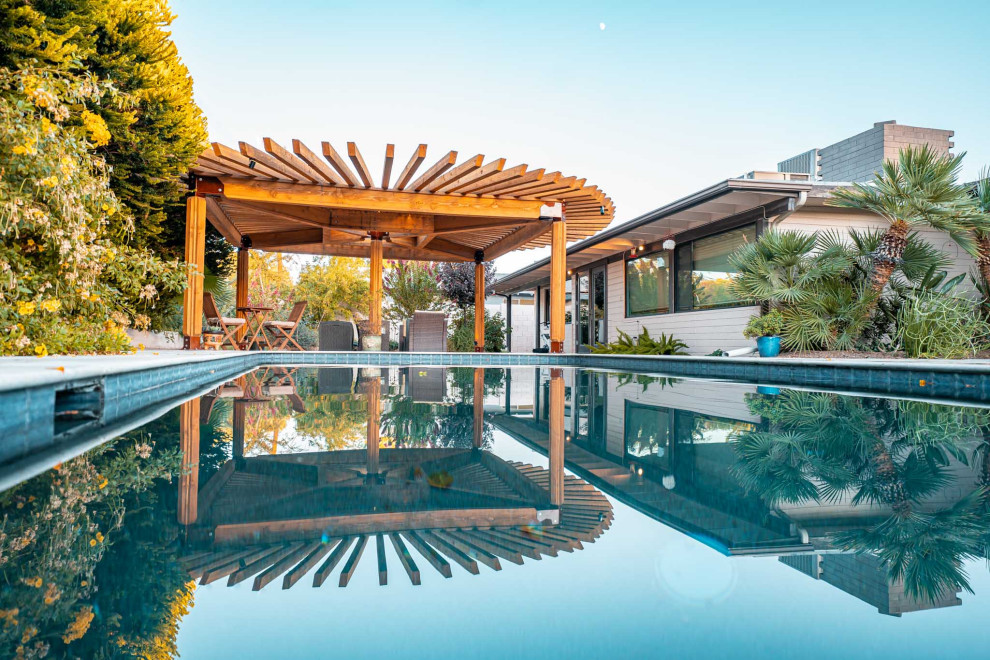 Mountain style pool photo in Phoenix