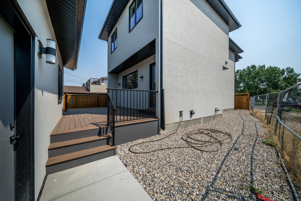 Transitional home design photo in Calgary