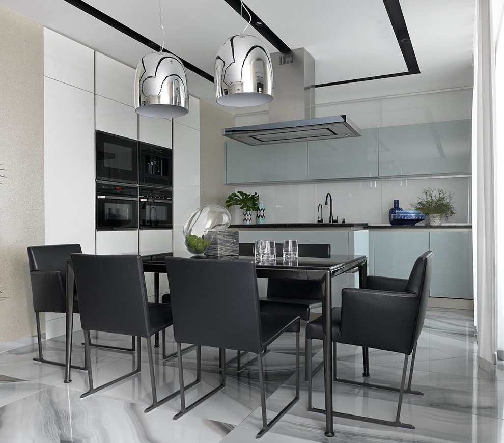 Inspiration for a large contemporary single-wall eat-in kitchen in Moscow with an integrated sink, flat-panel cabinets, blue cabinets, solid surface benchtops, white splashback, glass tile splashback, black appliances, porcelain floors and with island.