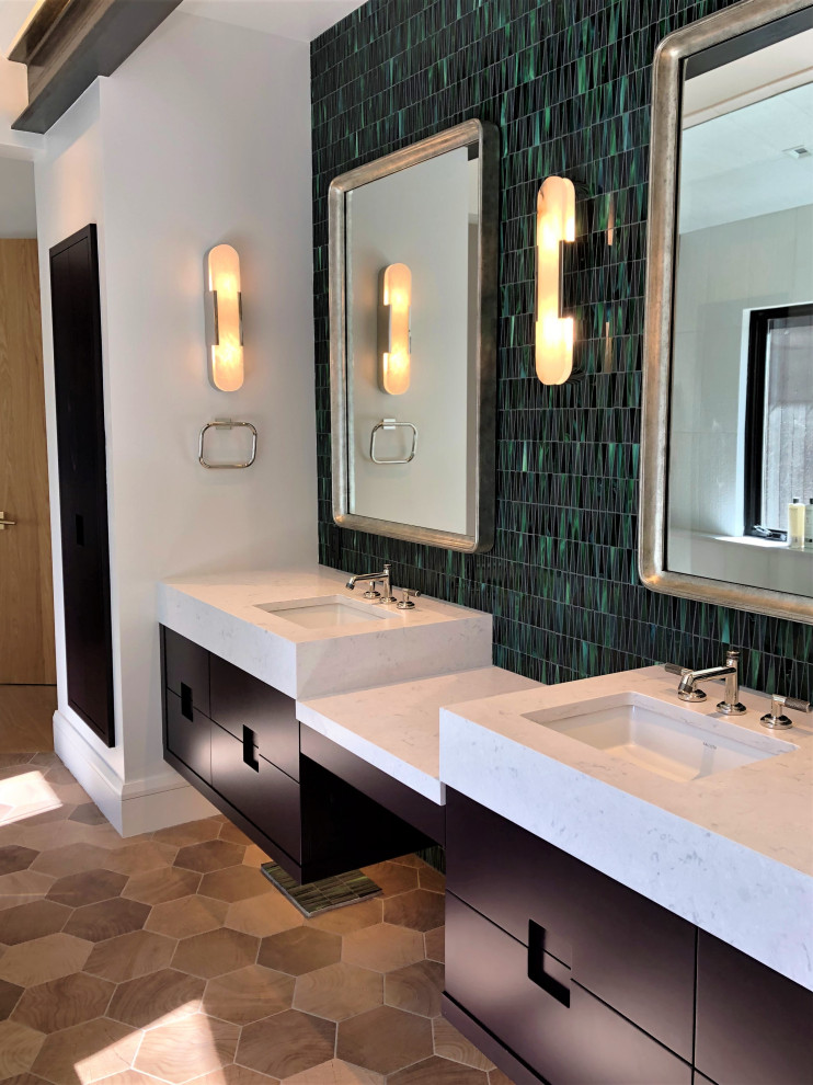 Photo of a mid-sized contemporary master wet room bathroom in Other with flat-panel cabinets, black cabinets, a freestanding tub, green tile, glass tile, white walls, wood-look tile, an undermount sink, brown floor, a hinged shower door, white benchtops, an enclosed toilet, a double vanity, a floating vanity and vaulted.