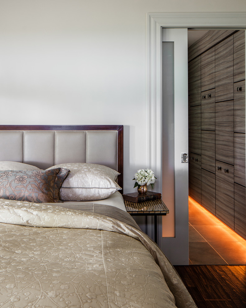Photo of a contemporary bedroom in San Francisco with white walls.