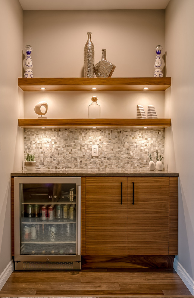 Medium sized home bar in Other.