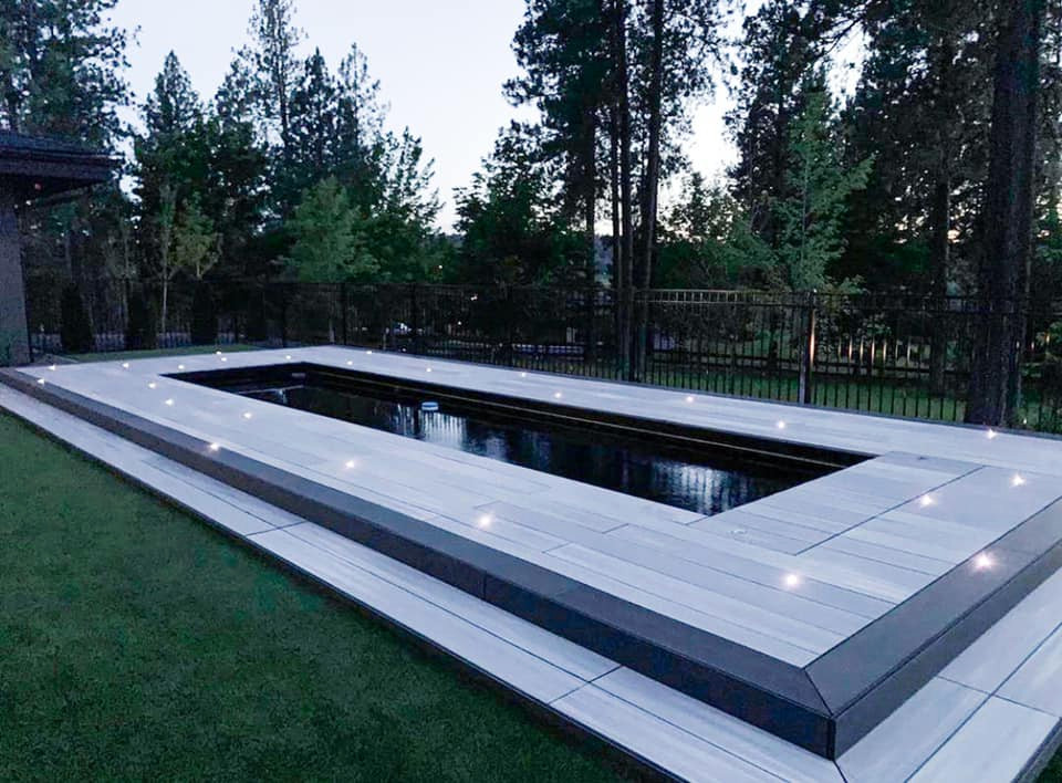 Inspiration for a transitional pool remodel in Calgary