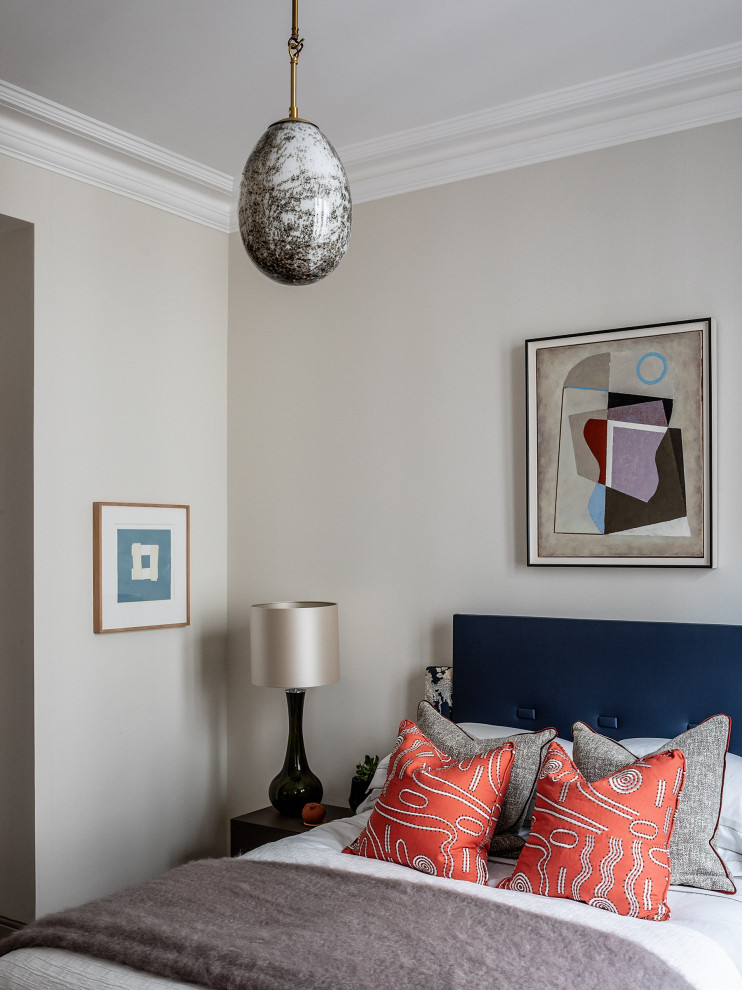 Medium sized traditional guest bedroom in London with white walls.