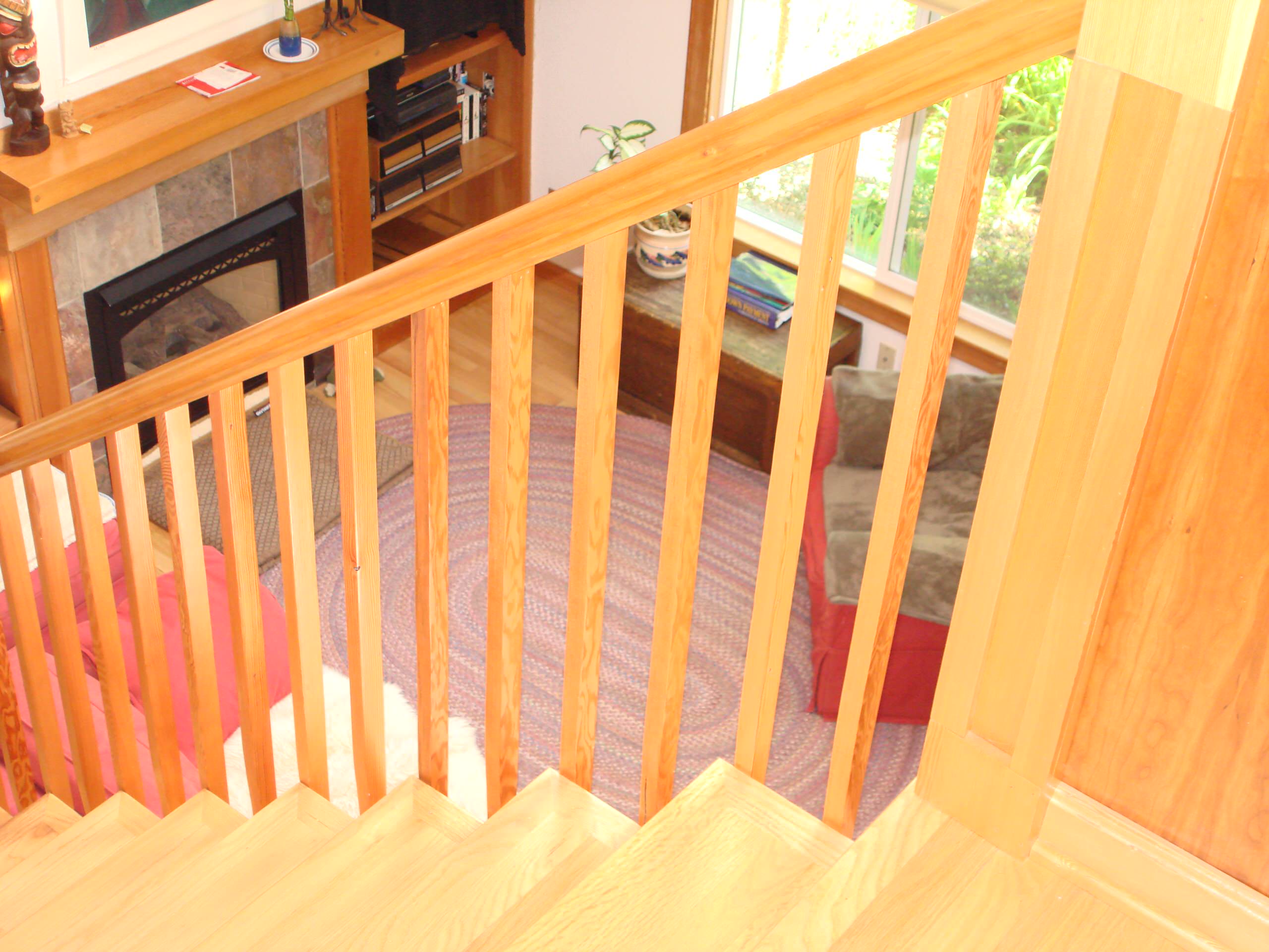 Custom Wood Stair Railing and Wood Flooring on Stairway and Hall