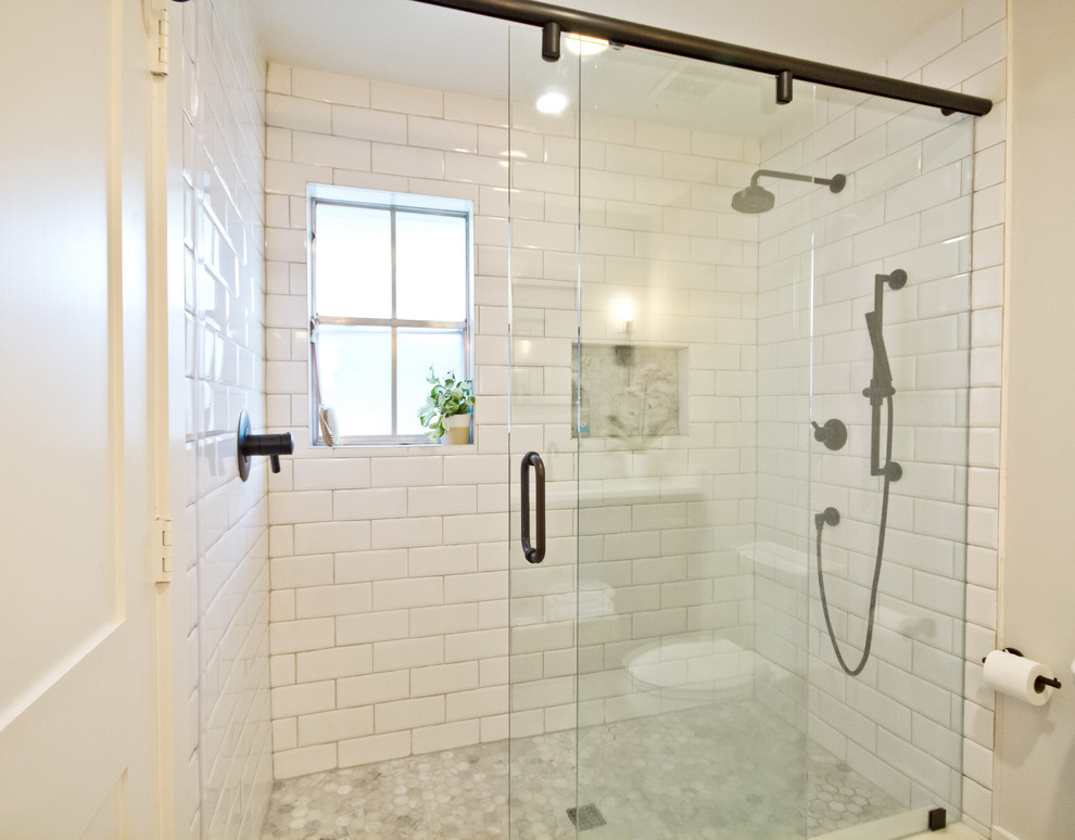 Inspiration for a small industrial master bathroom in Houston with shaker cabinets, grey cabinets, an alcove shower, a two-piece toilet, white tile, ceramic tile, grey walls, mosaic tile floors, an undermount sink, engineered quartz benchtops, white floor, a sliding shower screen and white benchtops.