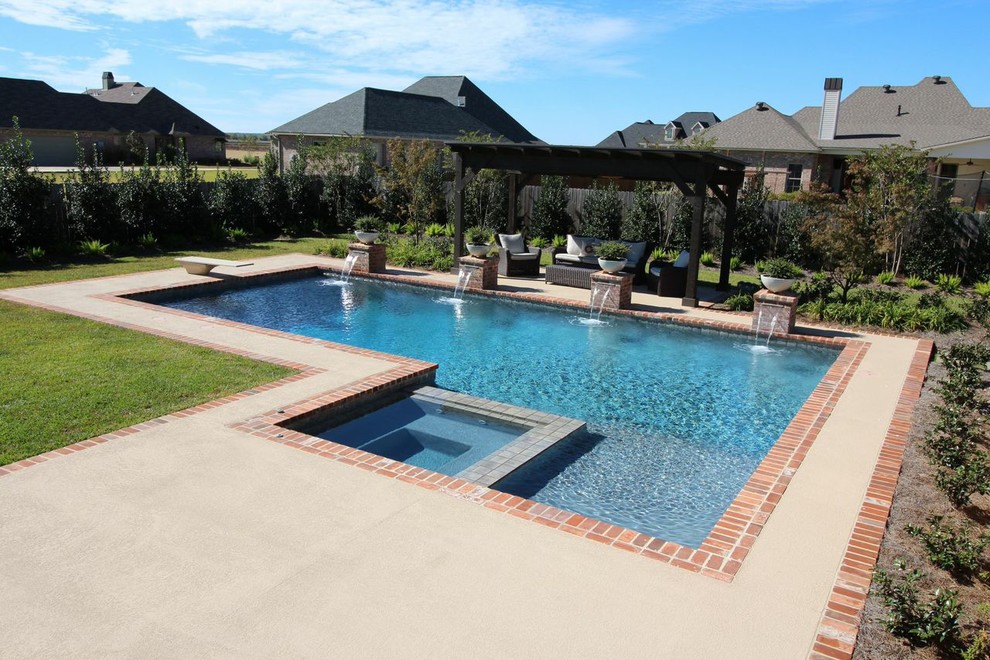 Hot tub - large transitional backyard concrete paver and rectangular lap hot tub idea in New Orleans