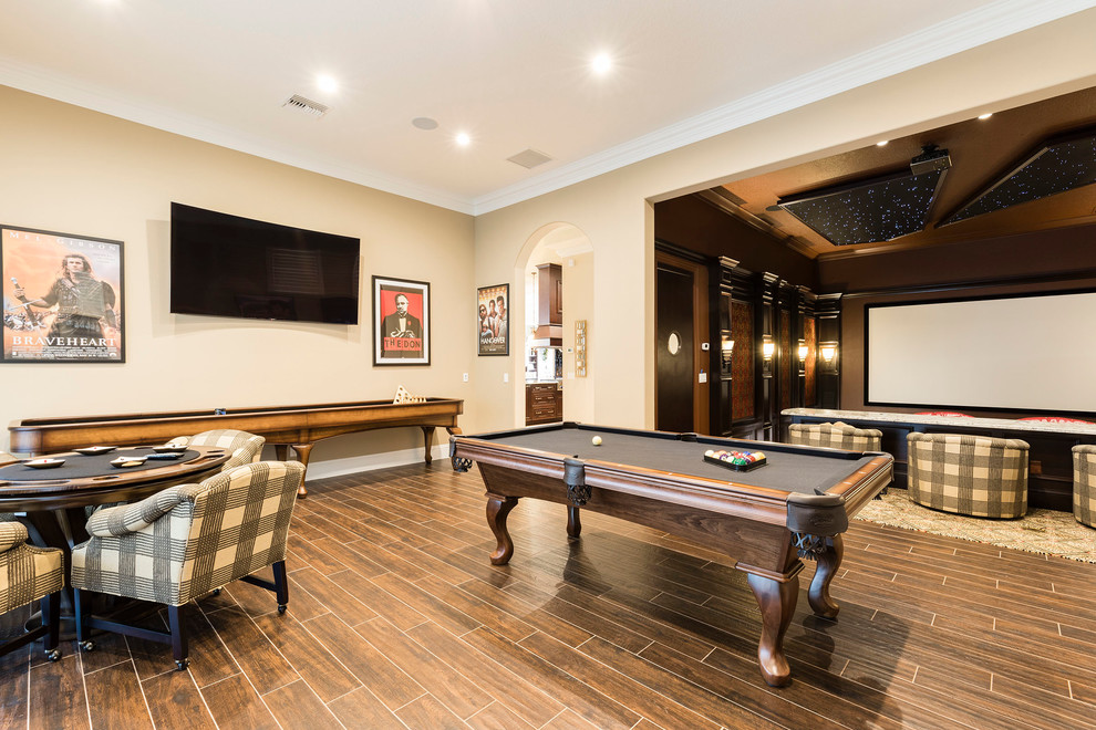 Design ideas for a mid-sized traditional open concept family room in Orlando with a game room, black walls, porcelain floors, no fireplace and a wall-mounted tv.