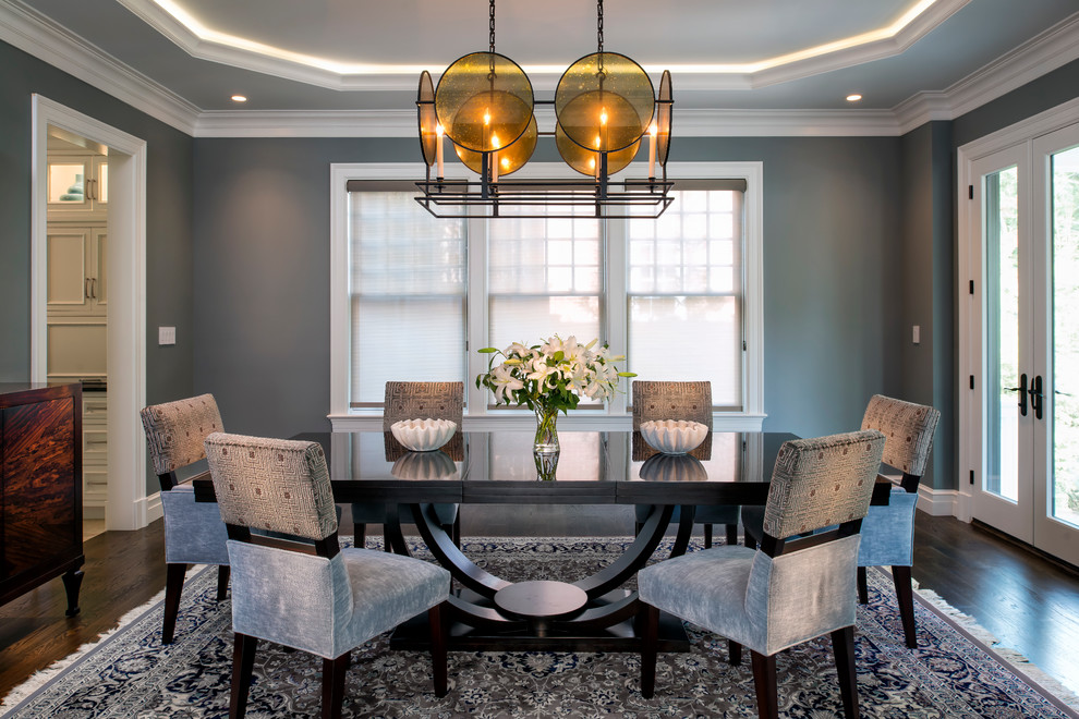 Transitional separate dining room in DC Metro with grey walls and dark hardwood floors.