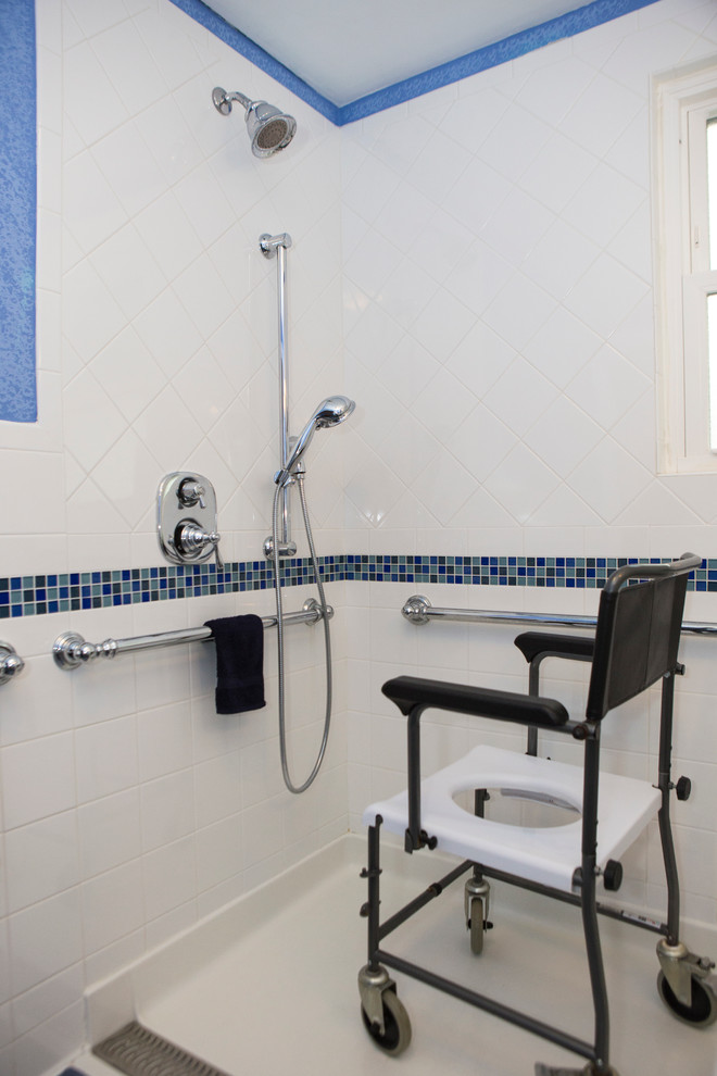 Inspiration for a transitional bathroom in Baltimore with blue tile and glass tile.