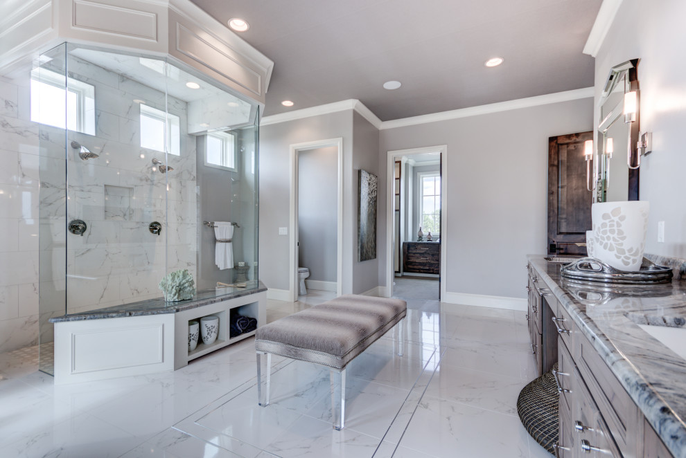 Example of a transitional home design design in Denver