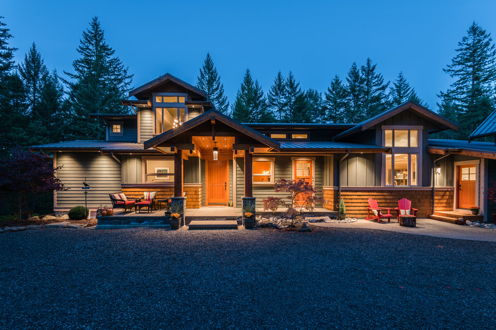 Mountain style home design photo in Vancouver