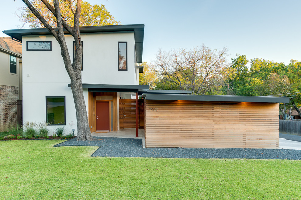 Photo of a contemporary two-storey exterior in Dallas.