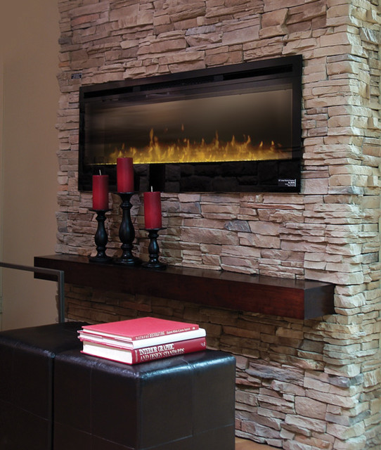 This beautiful fireplace is covered in Quick Fit Ledgestone panels. http://stonebrickveneer.com See it for yourself in a Stone Selex showroom.