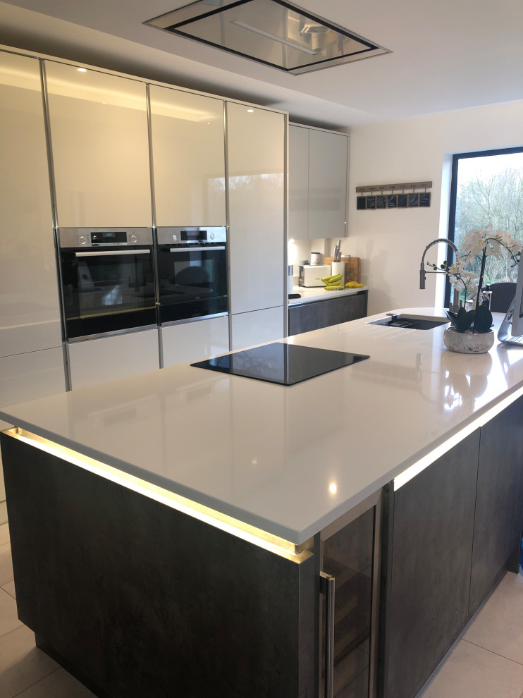 Modern kitchen in Cheshire with quartzite benchtops and with island.