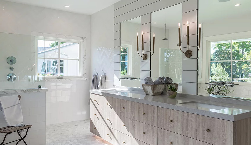 Photo of a large beach style bathroom in Boston with flat-panel cabinets, distressed cabinets, a freestanding tub, a curbless shower, white tile, ceramic tile, white walls, marble floors, an undermount sink, quartzite benchtops, grey floor, an open shower and grey benchtops.
