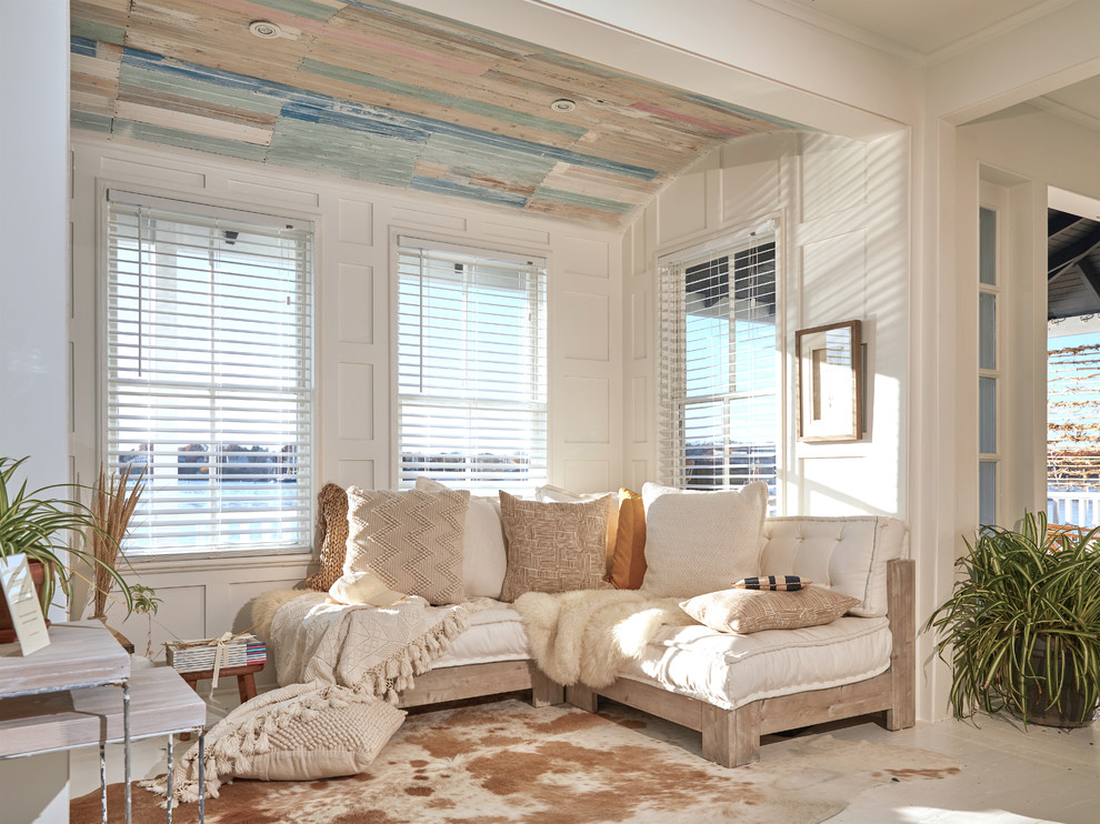 Design ideas for a small traditional open concept living room in Providence with white walls, painted wood floors and white floor.