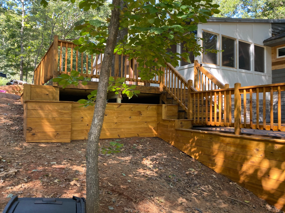 Example of a mountain style deck design in Atlanta