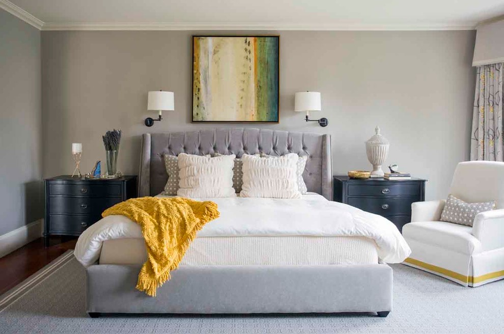 Inspiration for a large traditional master bedroom in Boston with grey walls and medium hardwood floors.