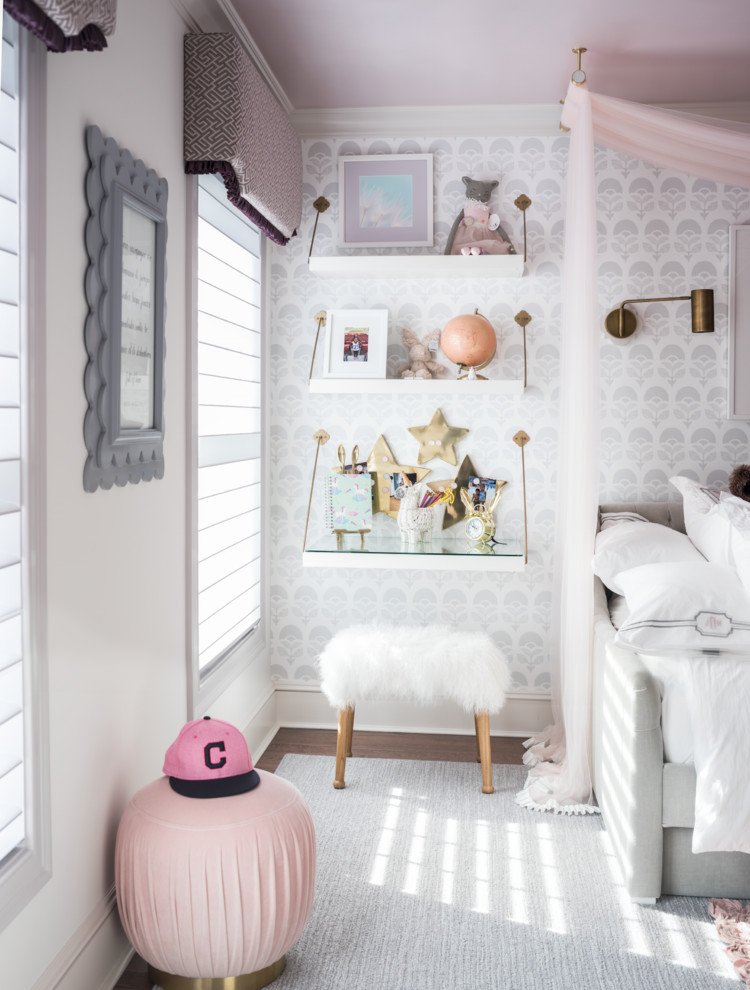 Mid-sized transitional kids' bedroom in New York with white walls, medium hardwood floors and brown floor for kids 4-10 years old and girls.